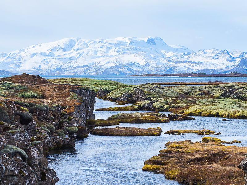 rocky landscapes and glacial lakes in iceland with mountains