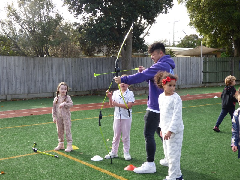 Kids play archery