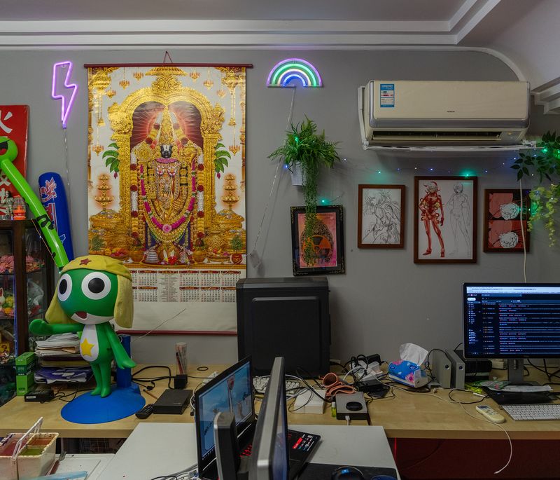 inside of a studio with various props, toys and screens