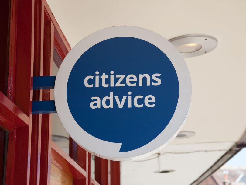 The Citizens Advice logo on a building sign