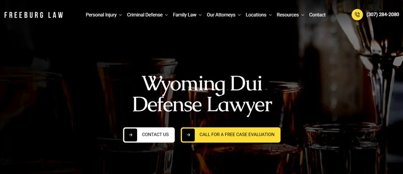 Website header for Freeburg Law featuring Wyoming DUI defense lawyer services, with contact buttons and a phone number provided.