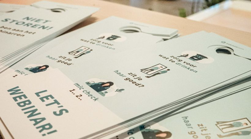 doorhanger with text lets webinar on it