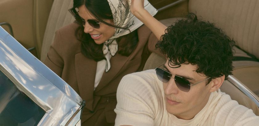 Laura and Nacho in their car on a California road trip