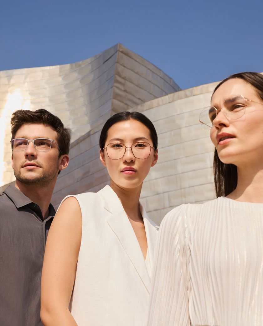 Male model and two female model wearing s-Titanium glasses