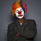 A clown looks serious