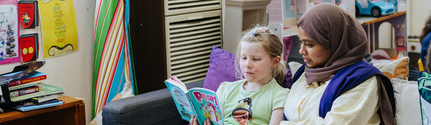 staff and child reading