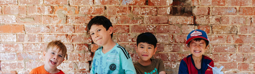 boys smiling for camera
