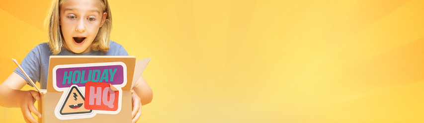 Image of a girl in a grey t-shirt, holding a box with a Holiday HQ sticker on, looking amazed at contents unknown inside. She is on a yellow background