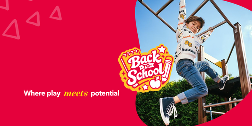 Child hanging from monkey bars with a "Back to School" graphic, blue sky background, and text: "Where play meets potential."