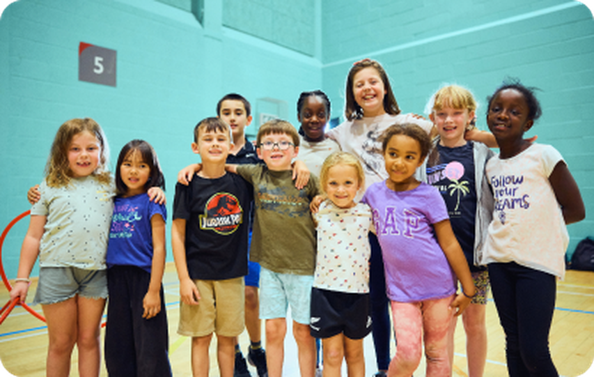 group_of_children_smiling_indoors