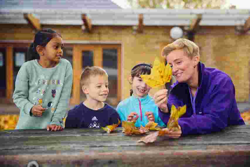 Staff member and children outdoor discovery session