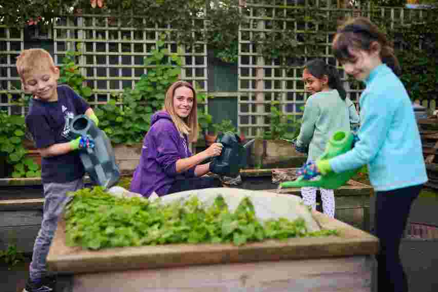 Gardening with staff member
