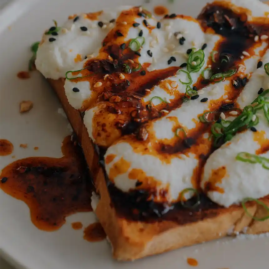 Ricotta Toast with Sichuan Chili Crisp drizzle