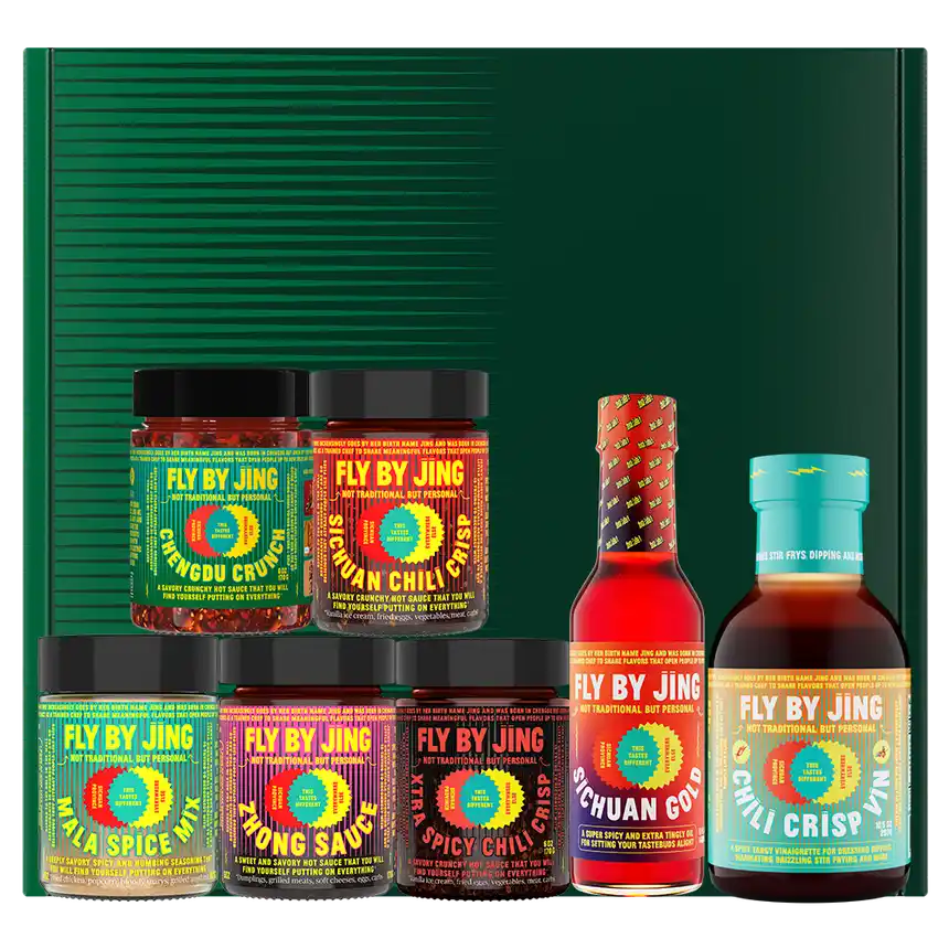 Product line up of Fly By Jing sauces with the box