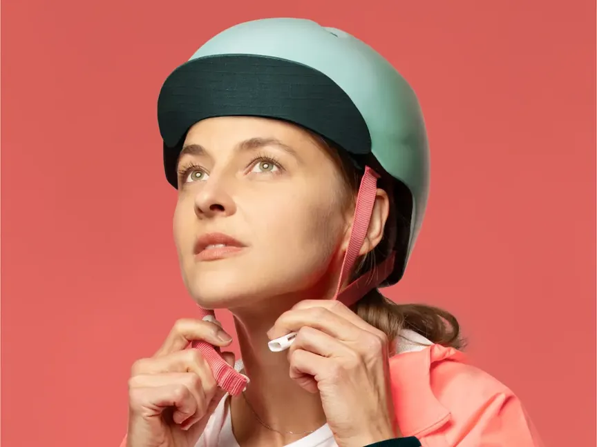 Lady wearing a bicycle helmet