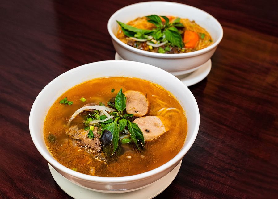 Find the right aged care home- photo of two large bowks of orange coloured soup like Pho