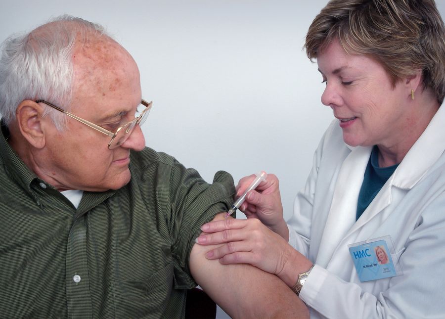 Aged care resident receiving Covid vaccination