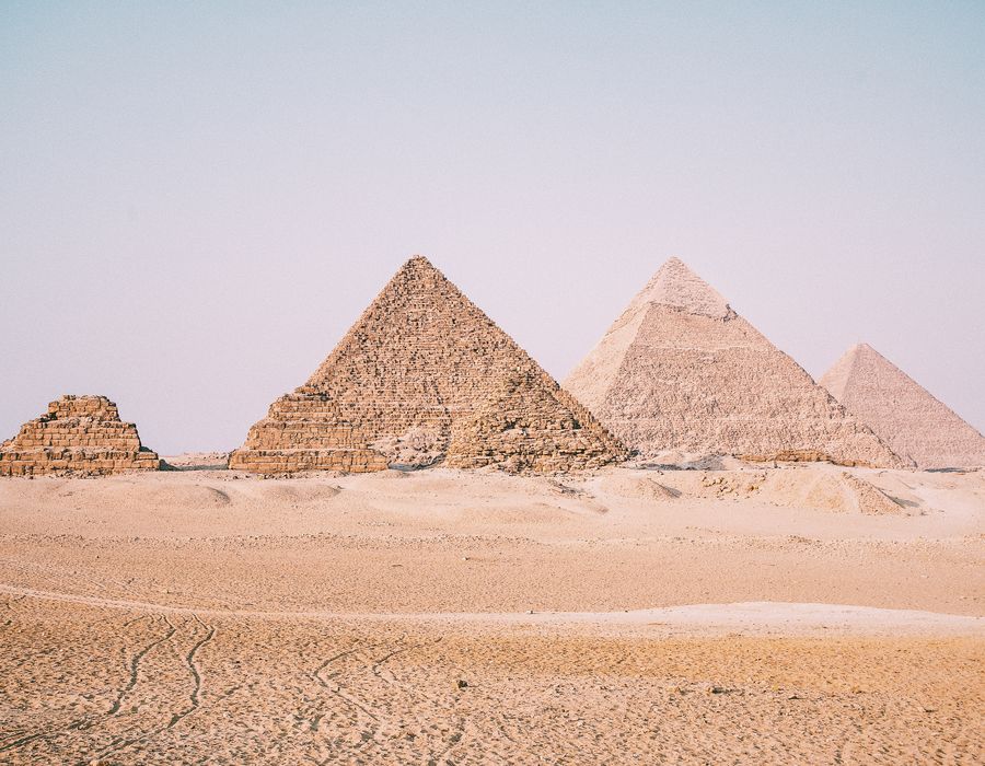 three pyramids in desert in egypt
