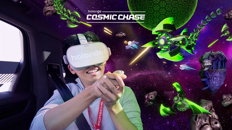 person in the backseat of a car, playing Cosmic Chase with headset on during a holoride