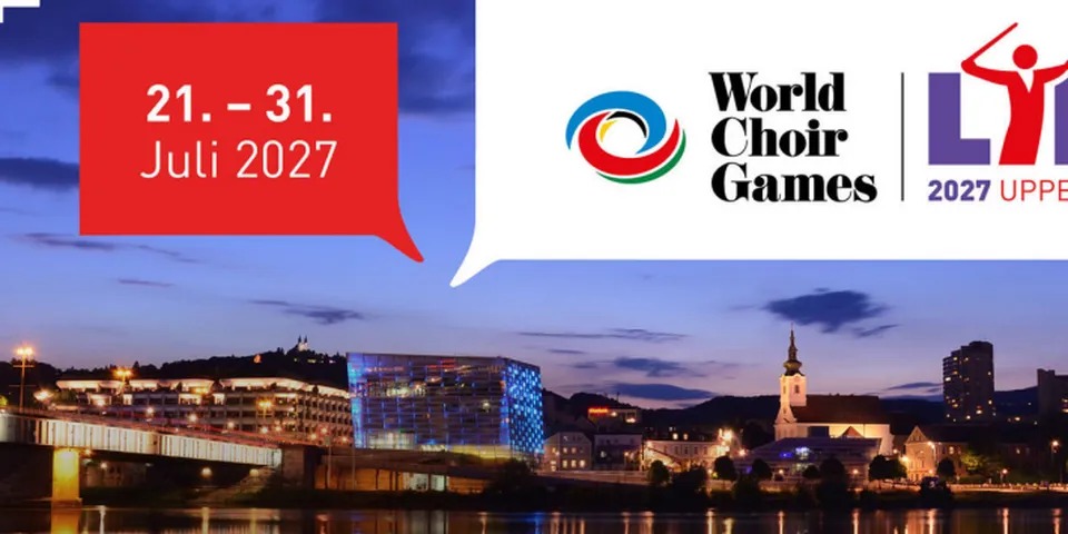 World Choir Games 21.-31. Juli 2027 in Linz, Österreich mit Skyline bei Nacht.