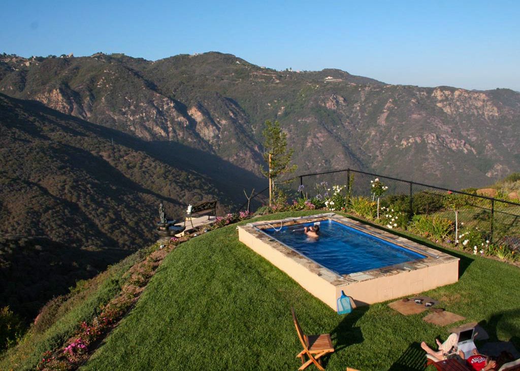 picture of Endless Pools Original pool in a slope backyard with a mountain view