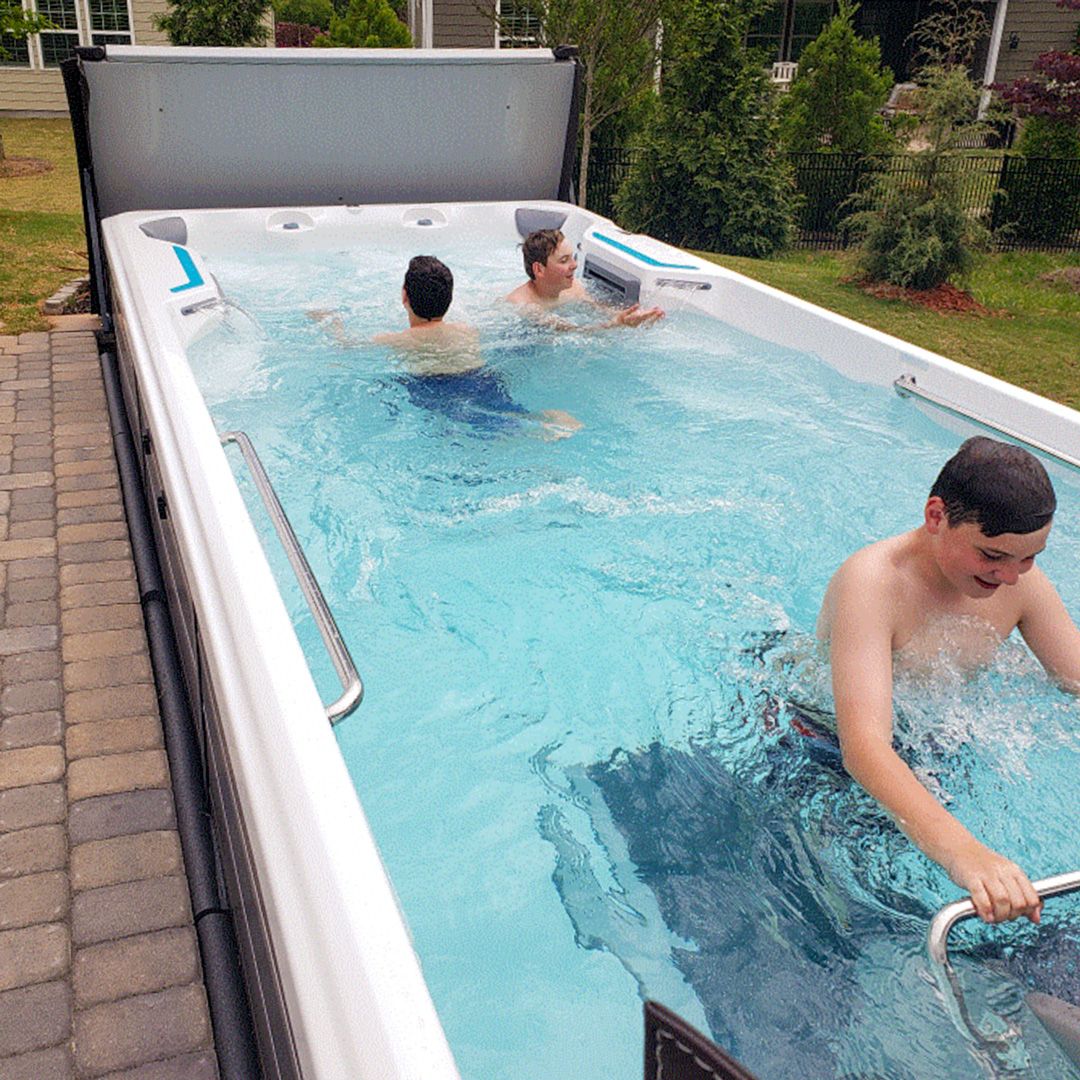 picture of kids playing in Endless Pools E700 swim spa
