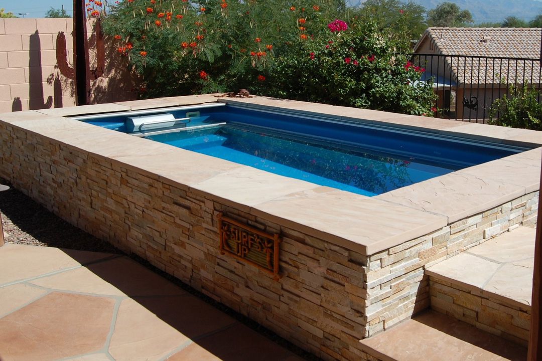 A picture of Endless Pools patio pool installed partially in-ground