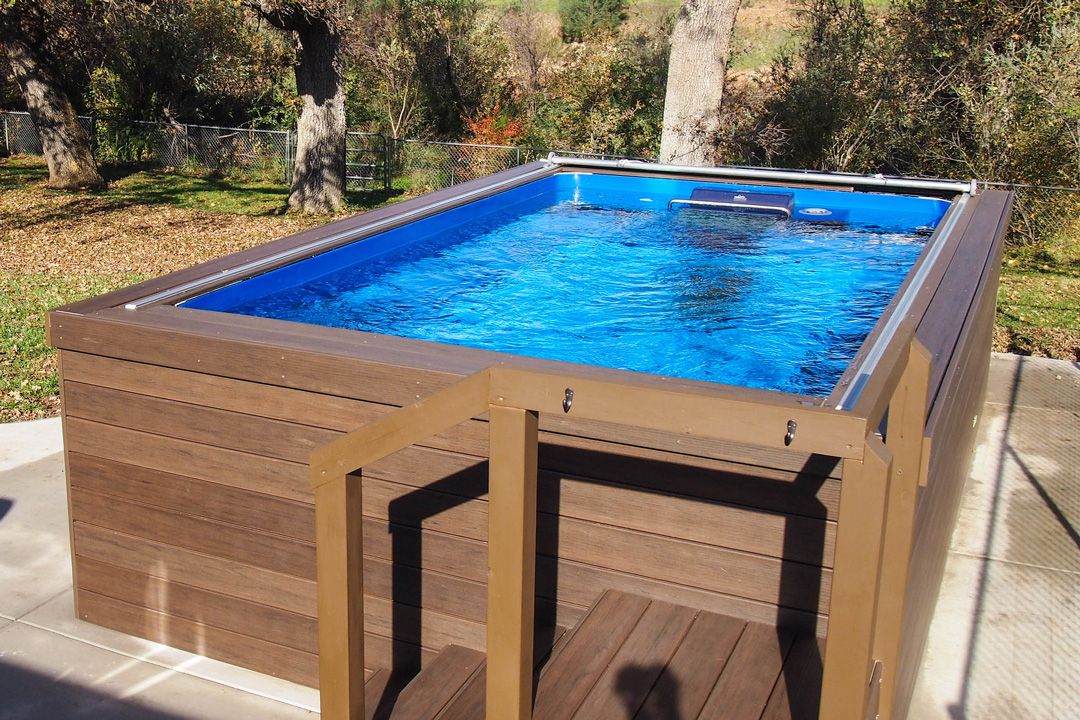 A picture of an outdoor pool patio installed aboveground