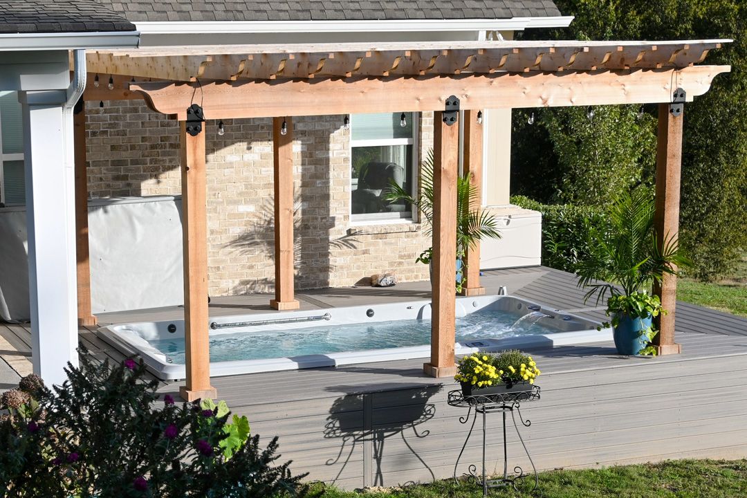 picture of a swim spa deck with seating outside of Nashville