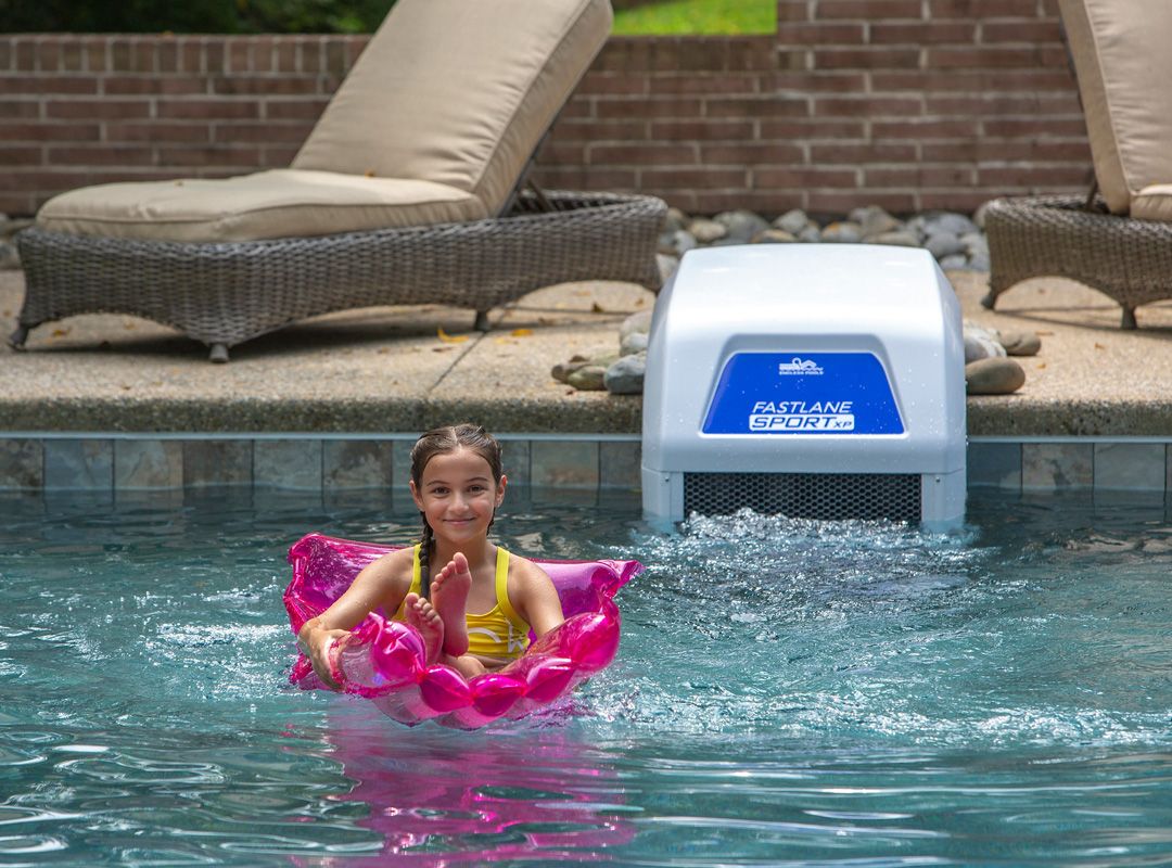 picture of girl enjoying the swim jet system of the Endless Pools Fastlane Sport XP system