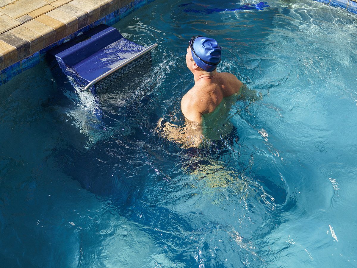 Man running on an underwater treadmill