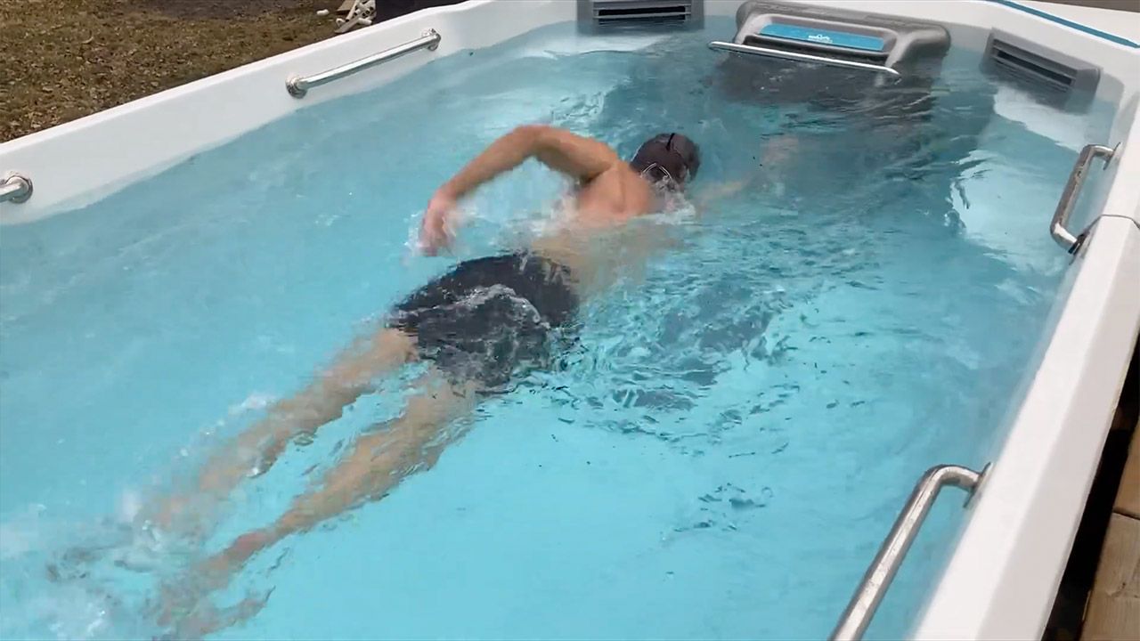 Video of a swimmer in a swim spa