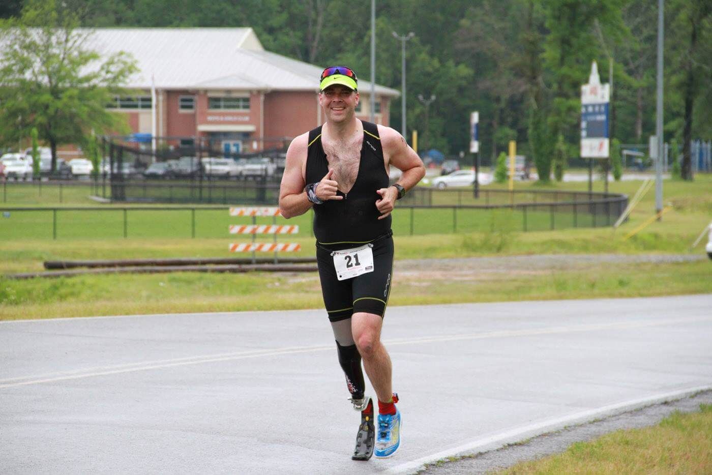 Chris M. running in a triathlon