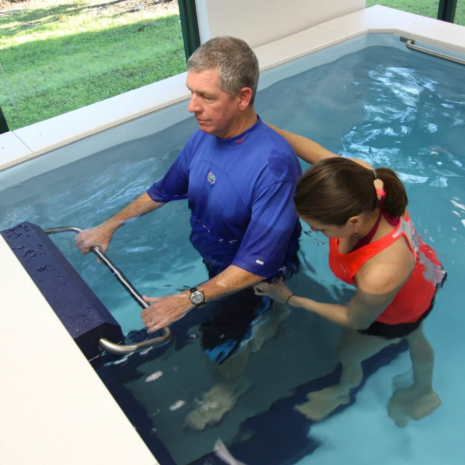 picture of a physical therapy session on the Endless Pools Underwater Treadmill