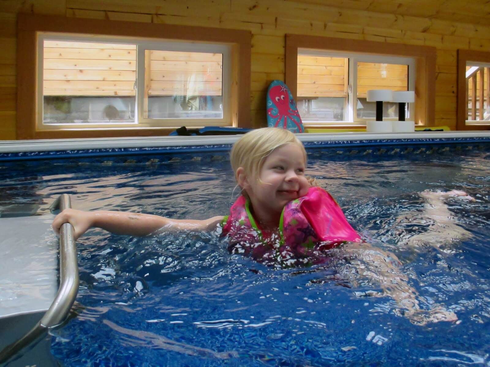 a girl plays in an Original Endless Pool in Canada