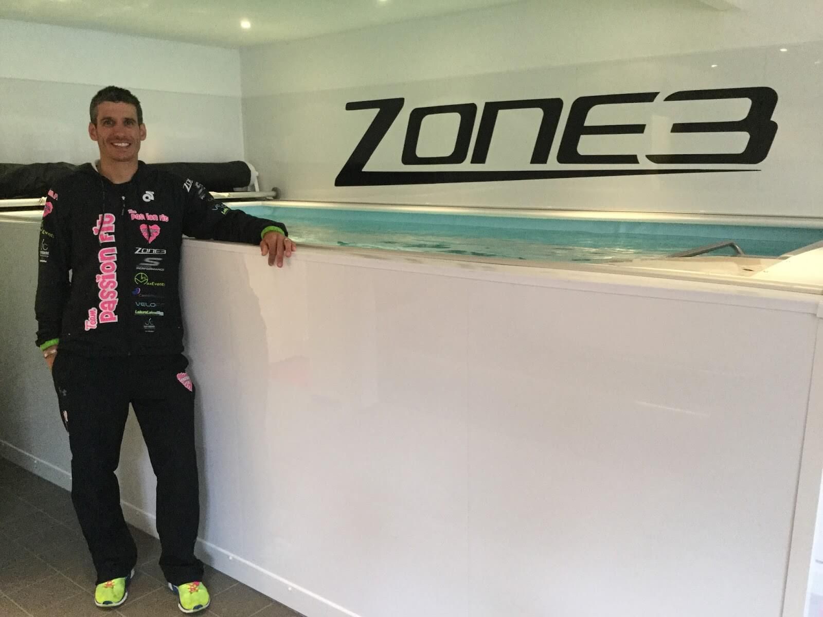 picture of triathlon coach Tom Ward and the Endless Pools swimming machine at his Passion Fit studio