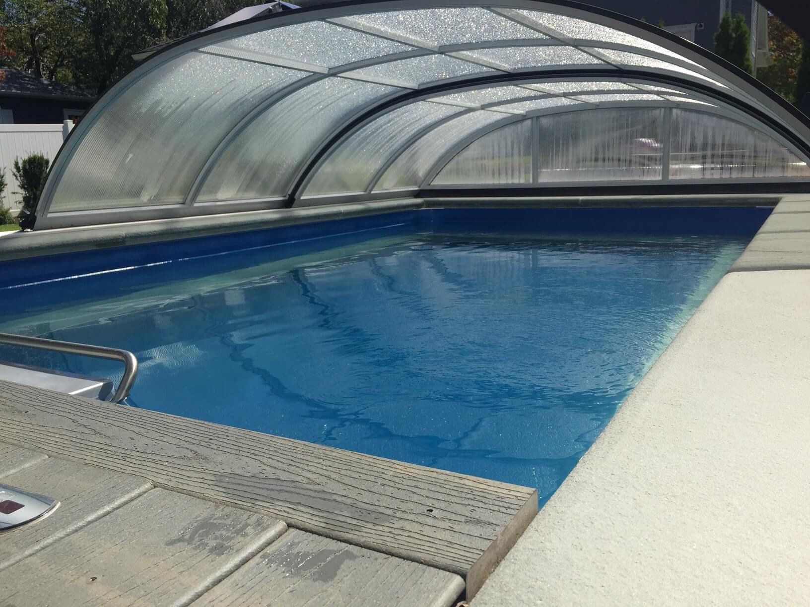a fully in-ground Endless Pool enclosure, partially retracted