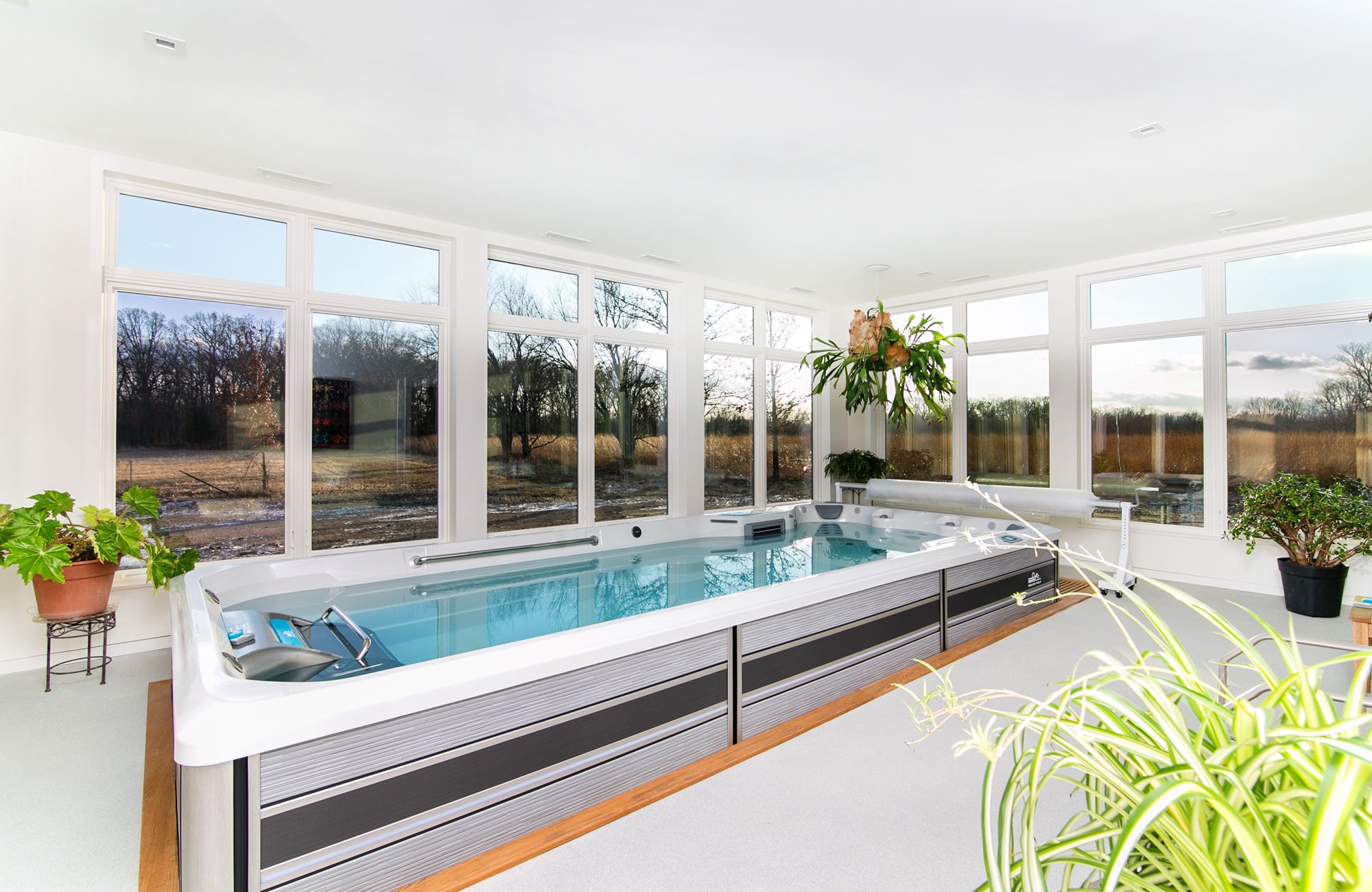 picture of a spa room with an Endless Pools Fitness System E700 swim spa