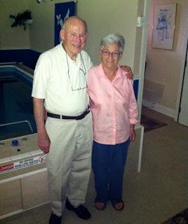 Ernie and Marge in front of their Endless Pools swimming machine