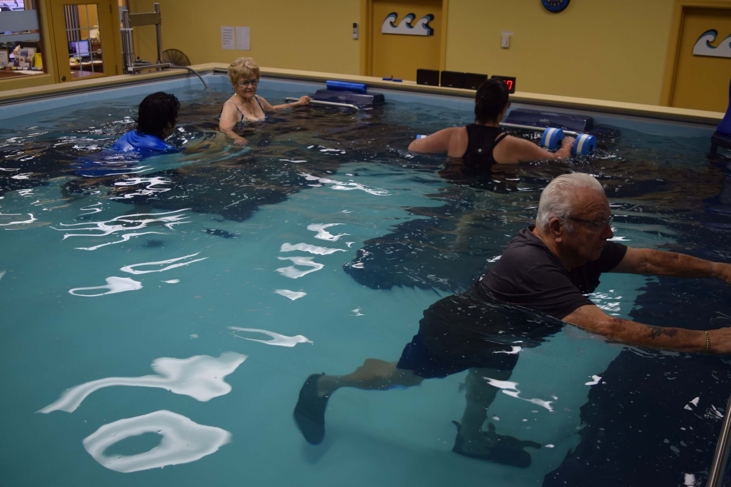 picture of a Dual Propulsion Endless Pool serving 3 physical therapy patients at FYZICAL in Yuma