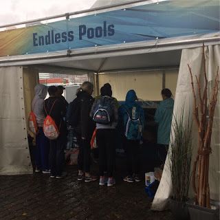 A crowd gathers at the Endless Pools booth at the ITU World Triathlon Grand Final Rotterdam