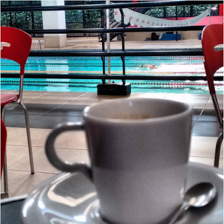 picture of a poolside cup of coffee