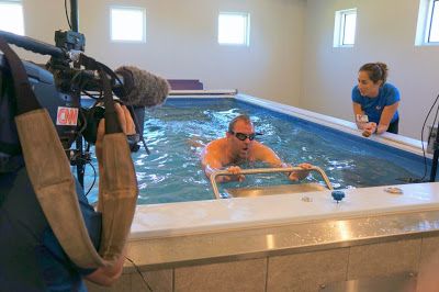 Picture of triathletes on the CNN Fit Nation Team train in the Endless Pools swimming pool 