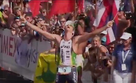 Picture of Professional Triathlete Pete Jacobs crossing the finish line at the IRONMAN World Championship