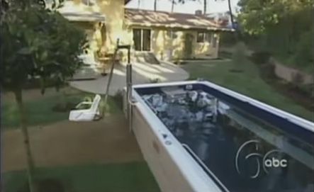 Picture of an Endless Pools original model in a backyard