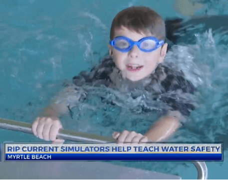 picture of child learning water safety with the Endless Pools Fastlane Pro current system