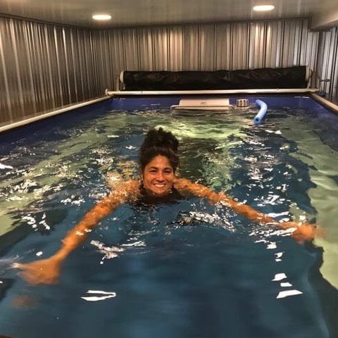 picture of swimmer in an Endless Pools Performance model therapy pool