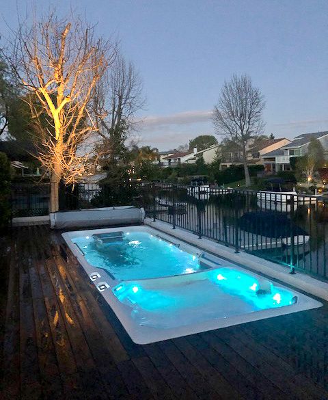 picture of the Endless Pools Fitness System E2000 swim spa at dusk
