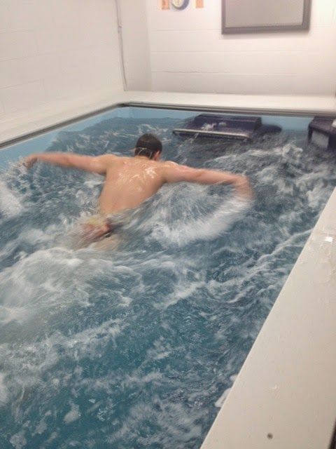 Picture of butterfly stroke in triathletes Jonny and Alistair Brownlee's Endless Pools Elite pool