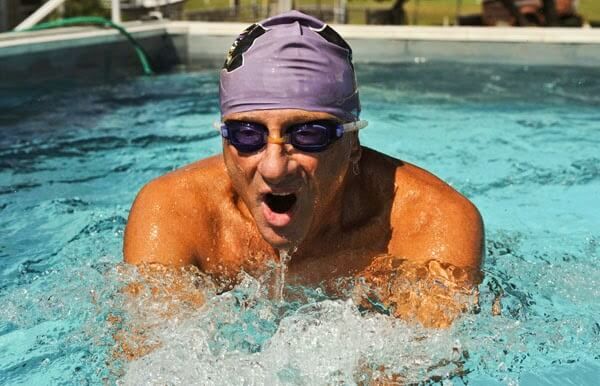 picture of Swim coach Ray Scharf swimming in his Endless Pool